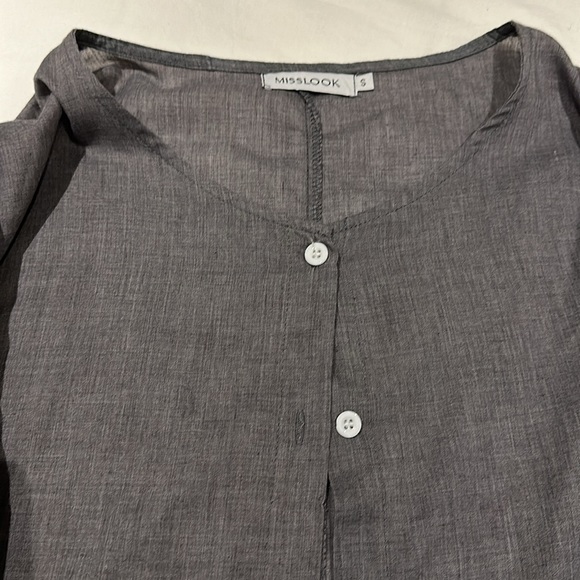 Super cute button down top. Never been worn. - Picture 2 of 2